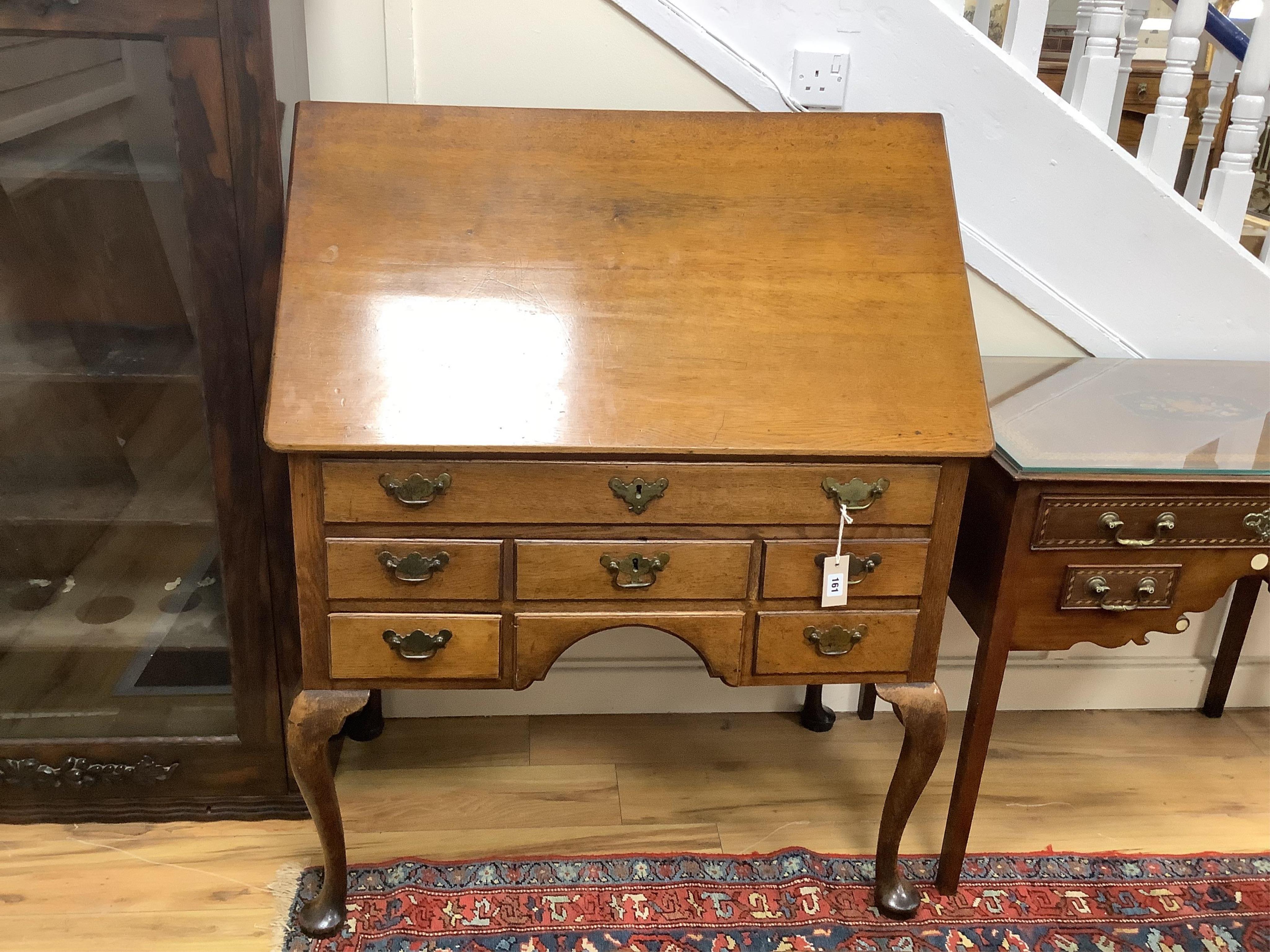 A George III oak six drawer architect's table with hinged rectangular top, width 90cm, depth 53cm, height 78cm. Condition - good